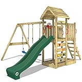 WICKEY Spielturm Klettergerüst MultiFlyer mit Holzdach, Schaukel & grüner Rutsche, Outdoor Kinder Kletterturm mit Sandkasten, Leiter & Spiel-Zubehör für den Garten